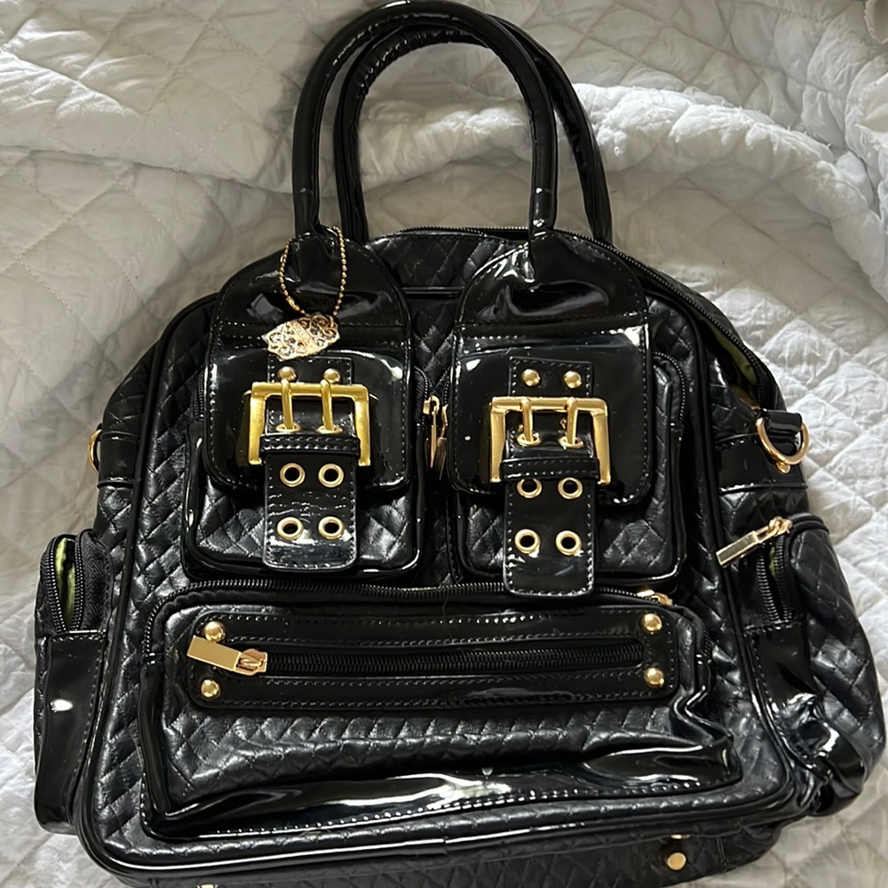 Leather and patented leather quilted clutch